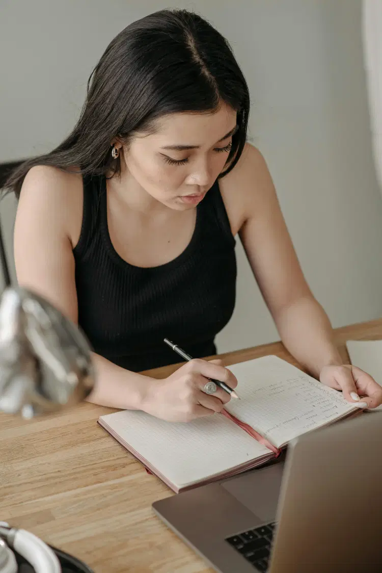 Student with glasses learning